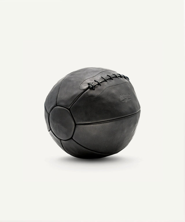 14 lb leather medicine ball by Leather Head Sports with durable stitched panels for strength training