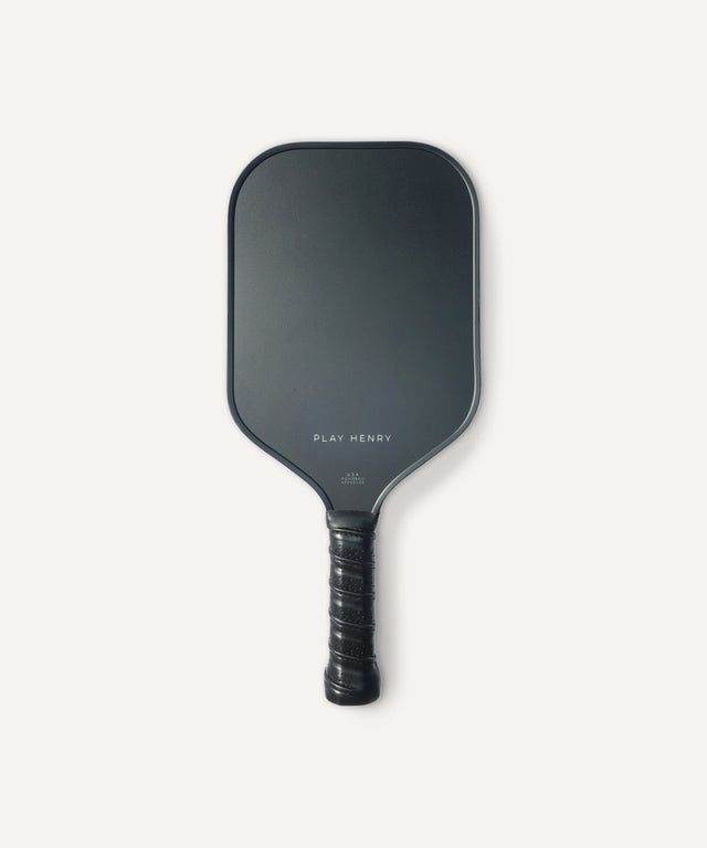 Play Henry black carbon fiber pickleball paddle with textured grip for enhanced play