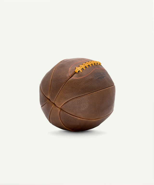 Leather Head Sports vintage leather medicine ball with stitched panels and classic design