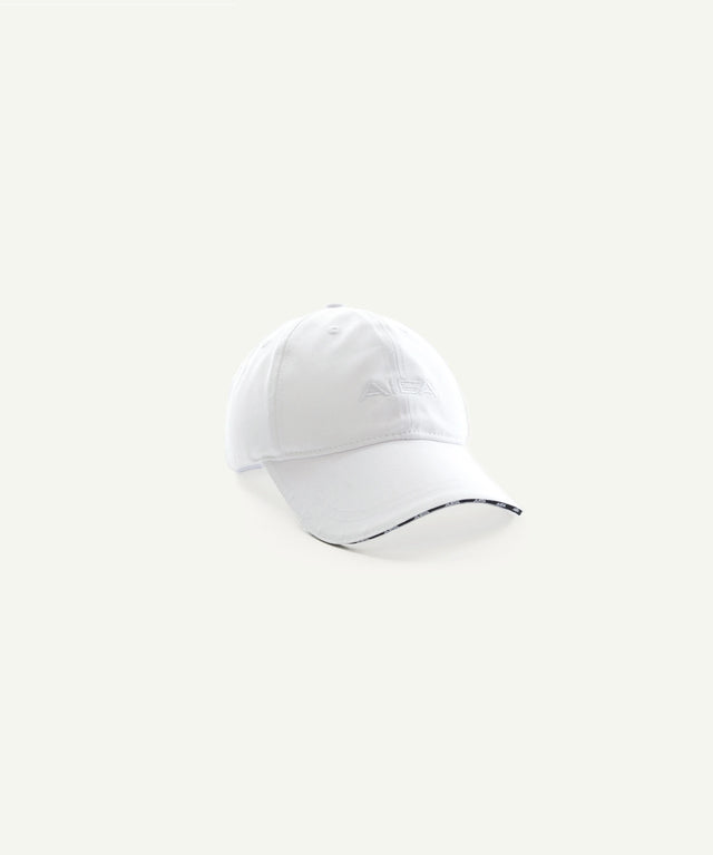 White AIEA Golf cap for fashionable womens golf clothing with curved brim and adjustable fit