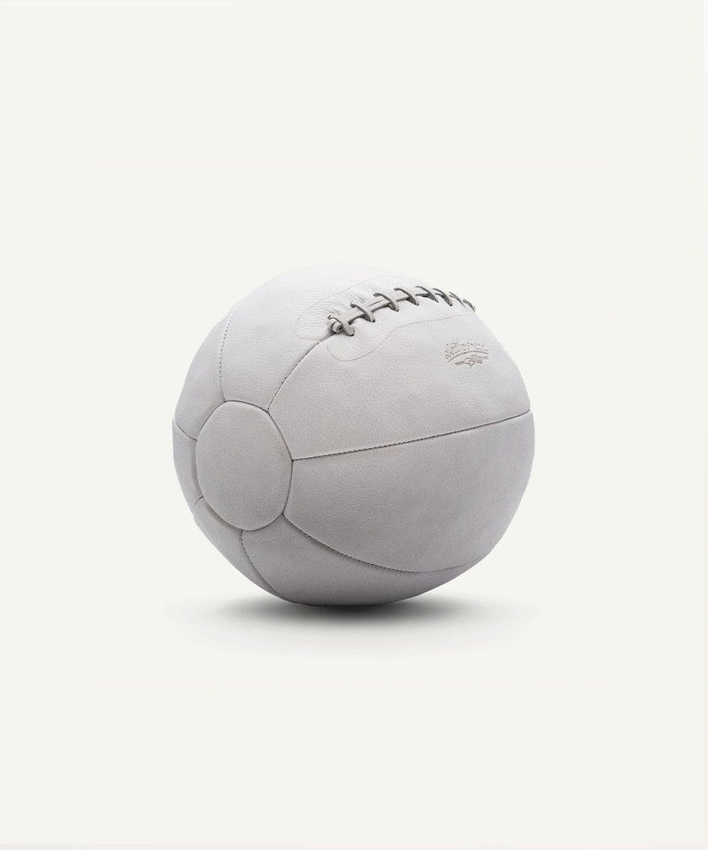 Leather Head Sports 14 lb white medicine ball with stitched leather cover for strength training