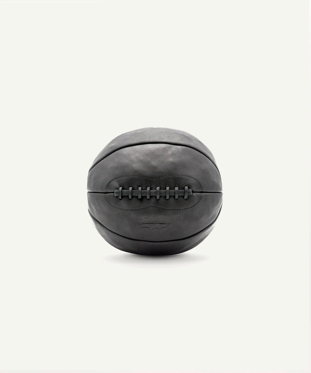 Leather Head Sports 8 lb black medicine ball with durable leather exterior and stitched detailing