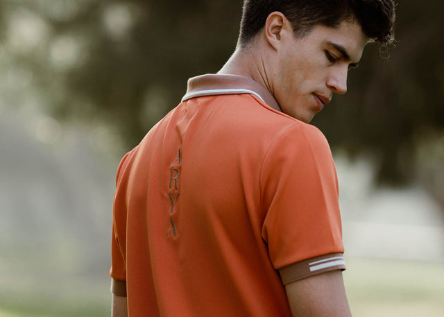 Woodstock Polo - Persimmon Orange - Huyck House Premium Sporting Goods