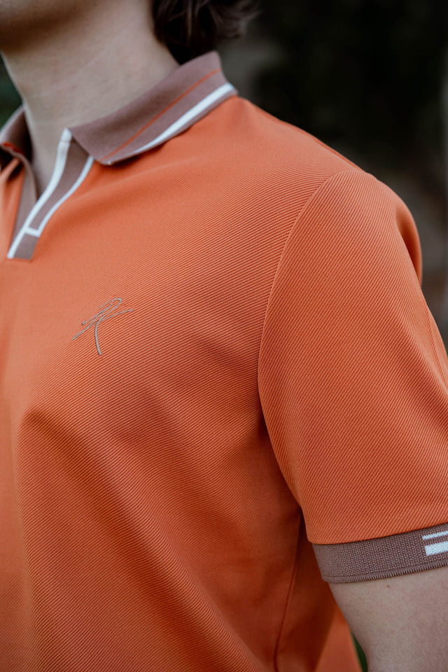Woodstock Polo - Persimmon Orange - Huyck House Premium Sporting Goods