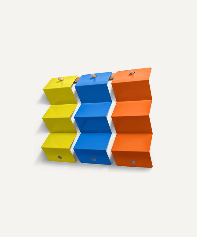 Aesthetic ping pong ball holders in yellow blue and orange for table tennis accessories