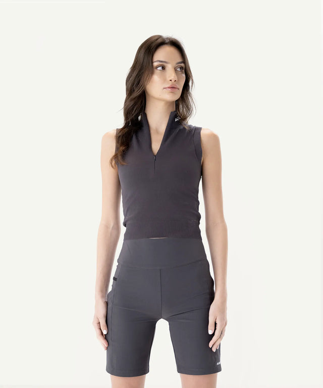 Fashionable womens golf clothing sleeveless black top and high-waisted black shorts by AIEA Golf