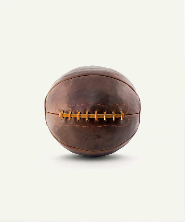 Leather Head Sports 14 lb Chromexcel medicine ball with premium brown leather and stitched laces