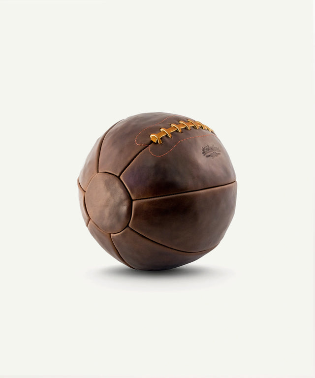 Leather Head Sports 14 lb Chromexcel medicine ball in brown leather with stitched detailing