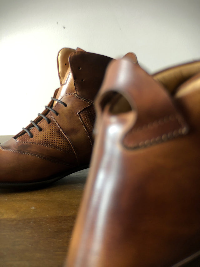 Italian made mens dress shoe in brown leather with detailed stitching and laces