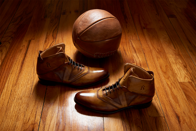 Italian made mens dress shoe by The Rafter Club in brown leather with vintage basketball on wooden floor