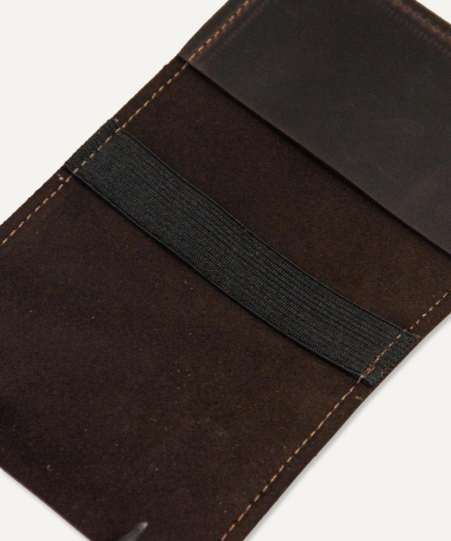 Pikore brown leather golf scorecard holder with black elastic band and detailed stitching