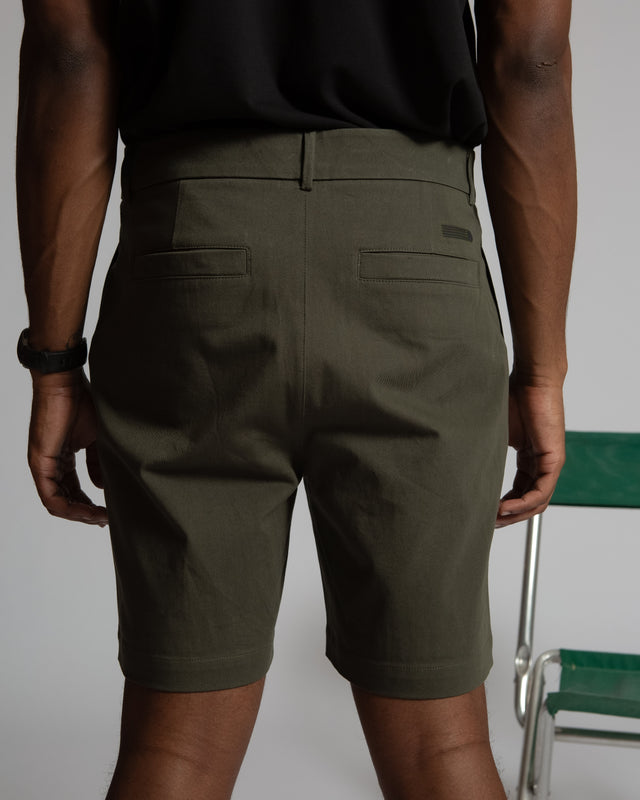 Back view of Kadet men's chino shorts in olive green with belt loops and back pockets