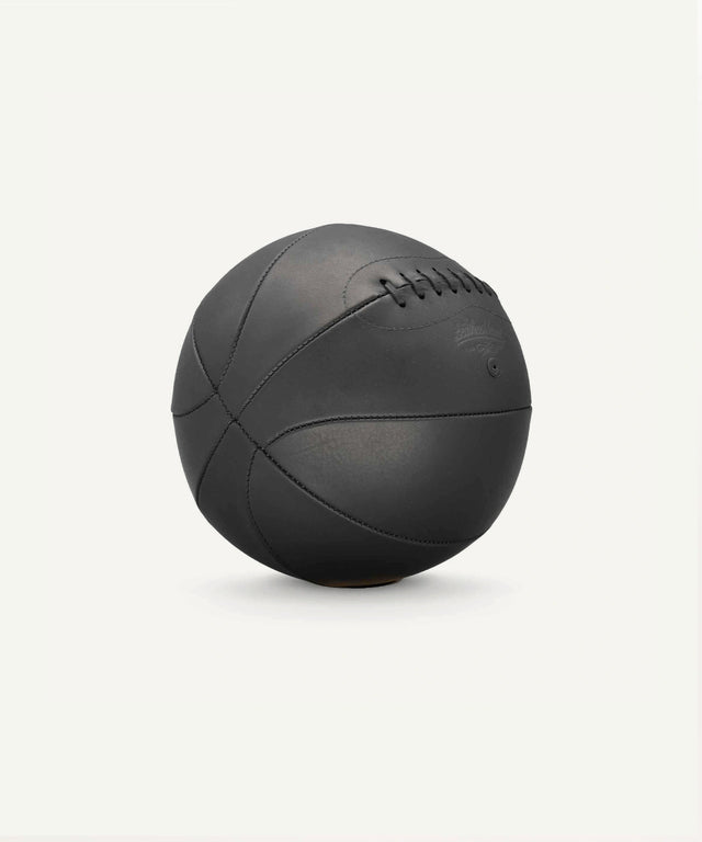 Leather Head Sports onyx basketball in black leather with traditional stitching and vintage design