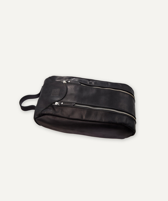 Pikore black leather golf shoe bag with dual zipper compartments and carry handle