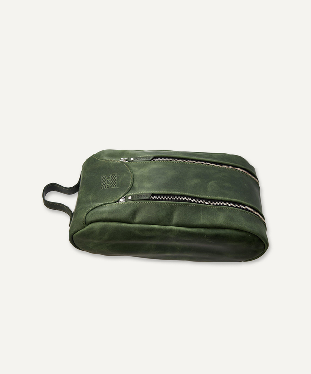 Pikore green leather golf shoe bag with dual zipper compartments and black handle