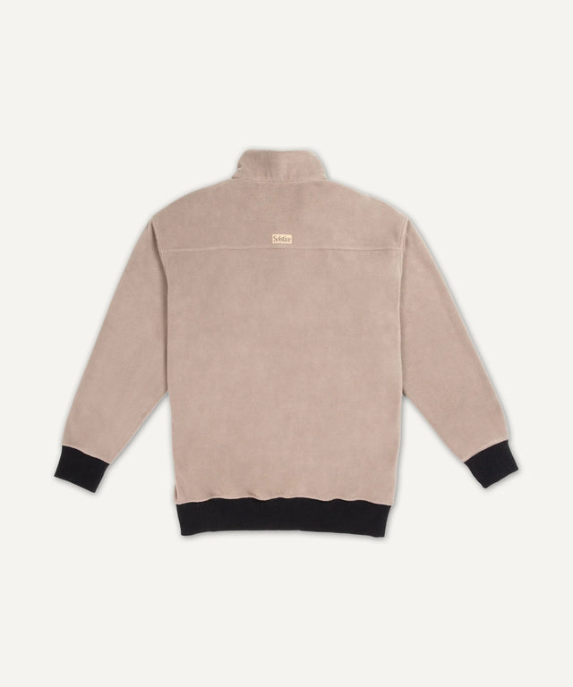 Solstice Athletics beige quarter-zip sweatshirt with black cuffs and hem premium workout clothing