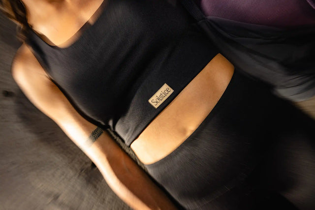 Solstice Athletics black workout crop top and leggings set in premium workout clothing
