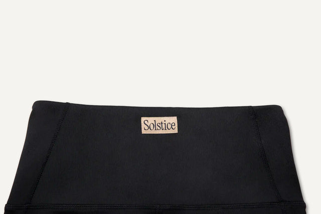 Black Solstice Athletics premium workout clothing waistband with logo label