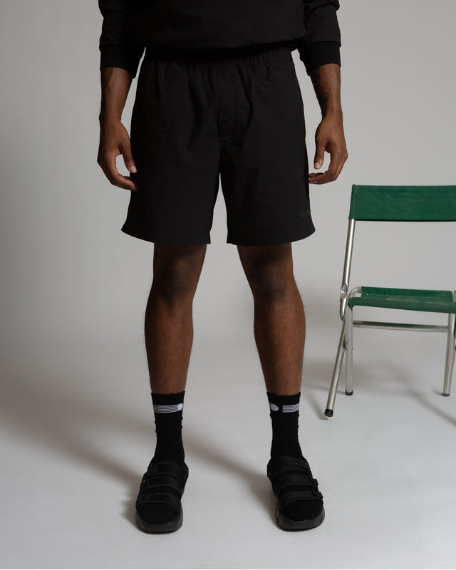 Kadet black women's pull-on athletic shorts with elastic waistband on model