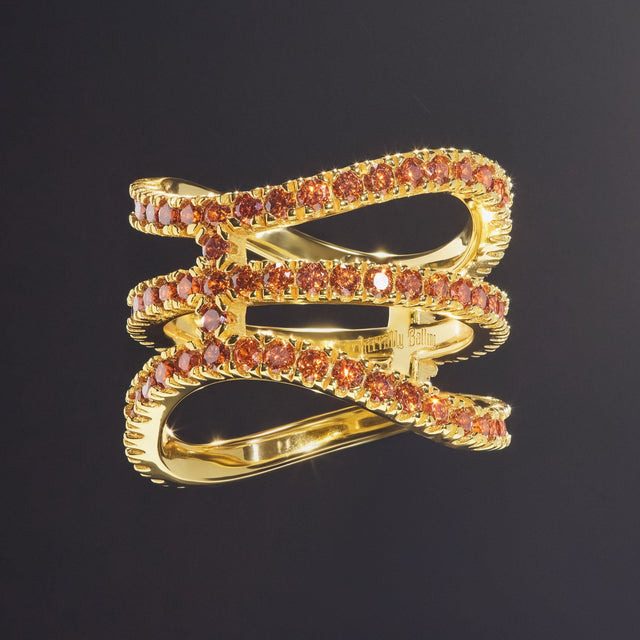 Gold ring with orange stones from Literally Balling Victor Solomon basketball collection gifts for basketball fans basketball jewelry