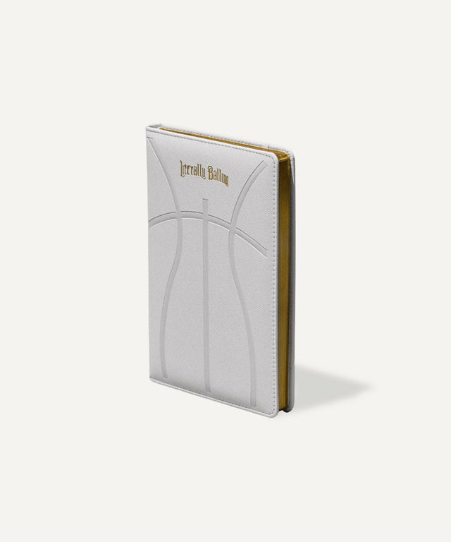 Literally Balling white basketball-themed notebook featuring Victor Solomon branding, perfect gifts for basketball fans