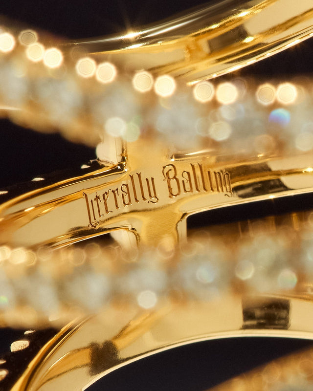 Literally Balling gold basketball jewelry close-up engraving for Victor Solomon gifts for basketball fans