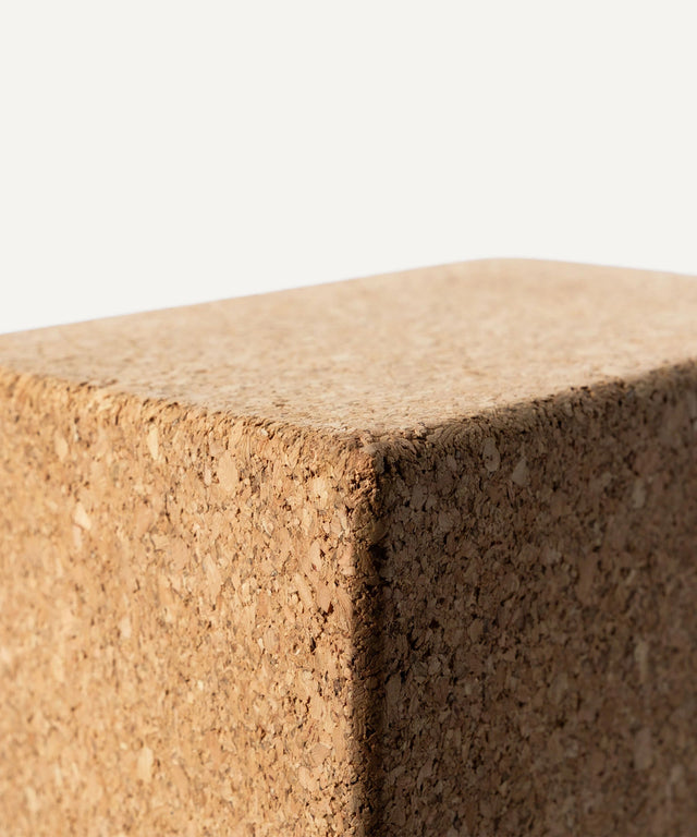 WeGym natural cork yoga block with smooth edges for stability and support during yoga practice