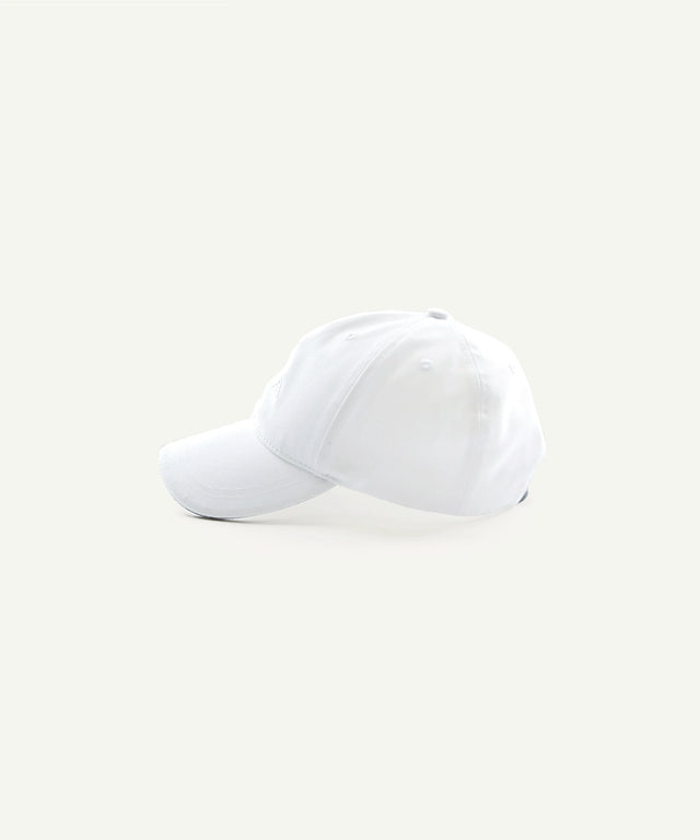White AIEA Golf cap for fashionable womens golf clothing with a curved brim design